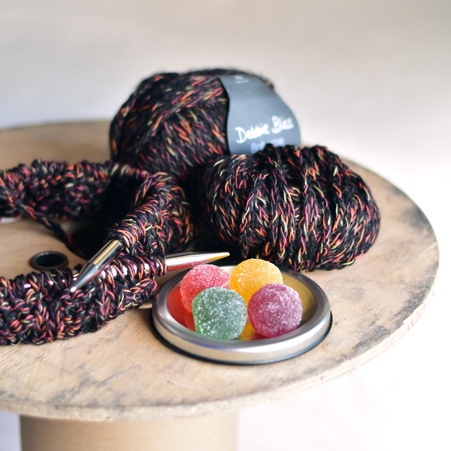 chunky yarn and a knitting needle, a work in progress